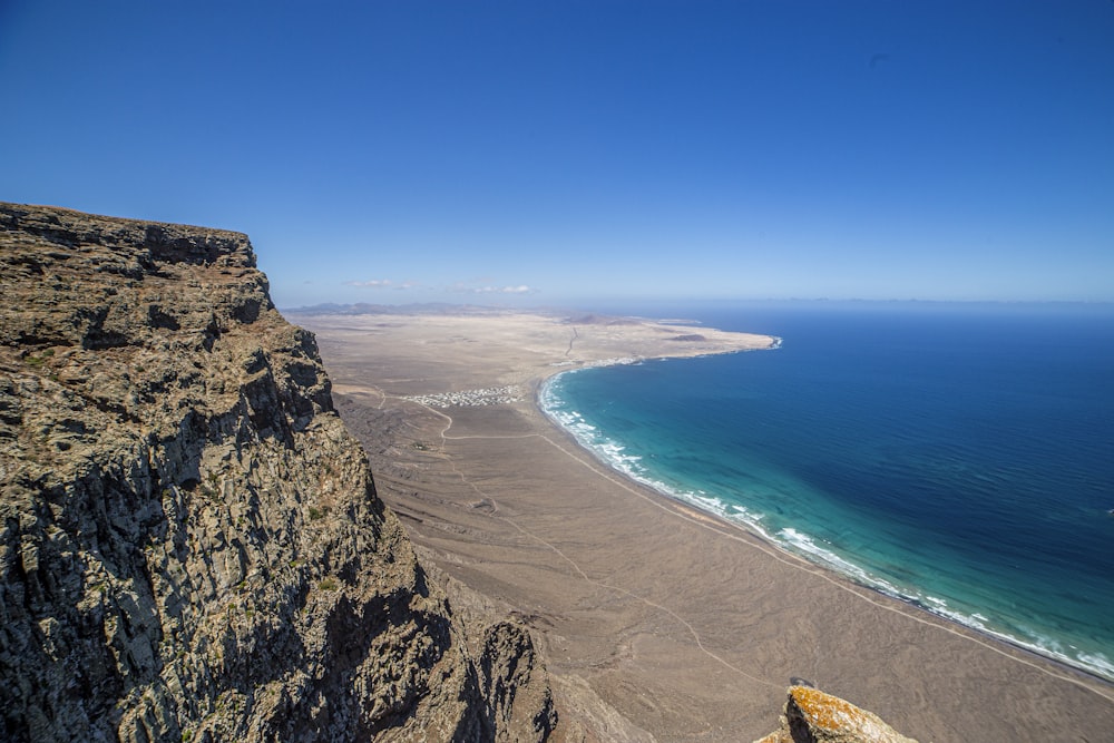 a view of the ocean from a cliff