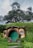 a hobbot with a green door surrounded by greenery