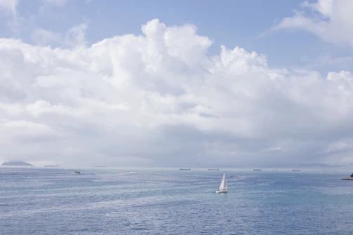 A serene scene of a sailor connecting with family via video call onboard.
