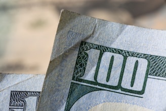 a close up of a one hundred dollar bill