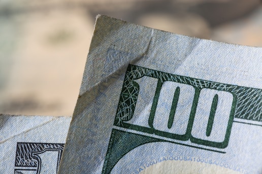 a close up of a one hundred dollar bill