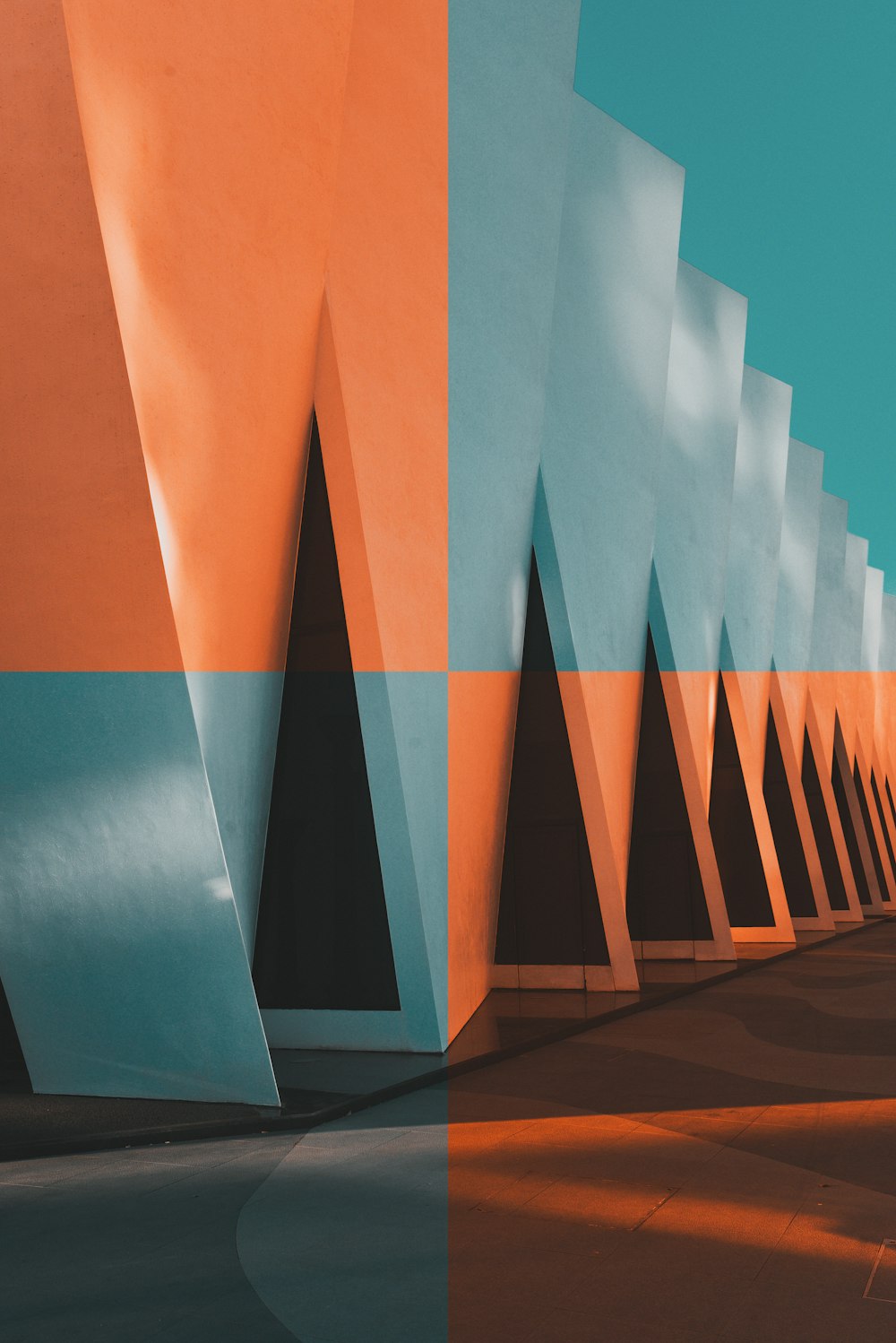 an abstract photo of an orange and blue building