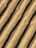 Close-up view of corrugated cardboard with parallel ridges and a textured surface in an earthy beige color.