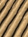 Close-up view of corrugated cardboard with parallel ridges and a textured surface in an earthy beige color.