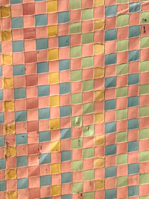 Vibrant chequered tiles arranged in a decorative pattern on a site.