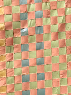 Close-up of a colorful hopping mat showing textured surface details.