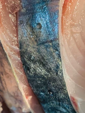 Close-up of fresh sturgeon fillets ready for cooking, highlighting their natural quality.