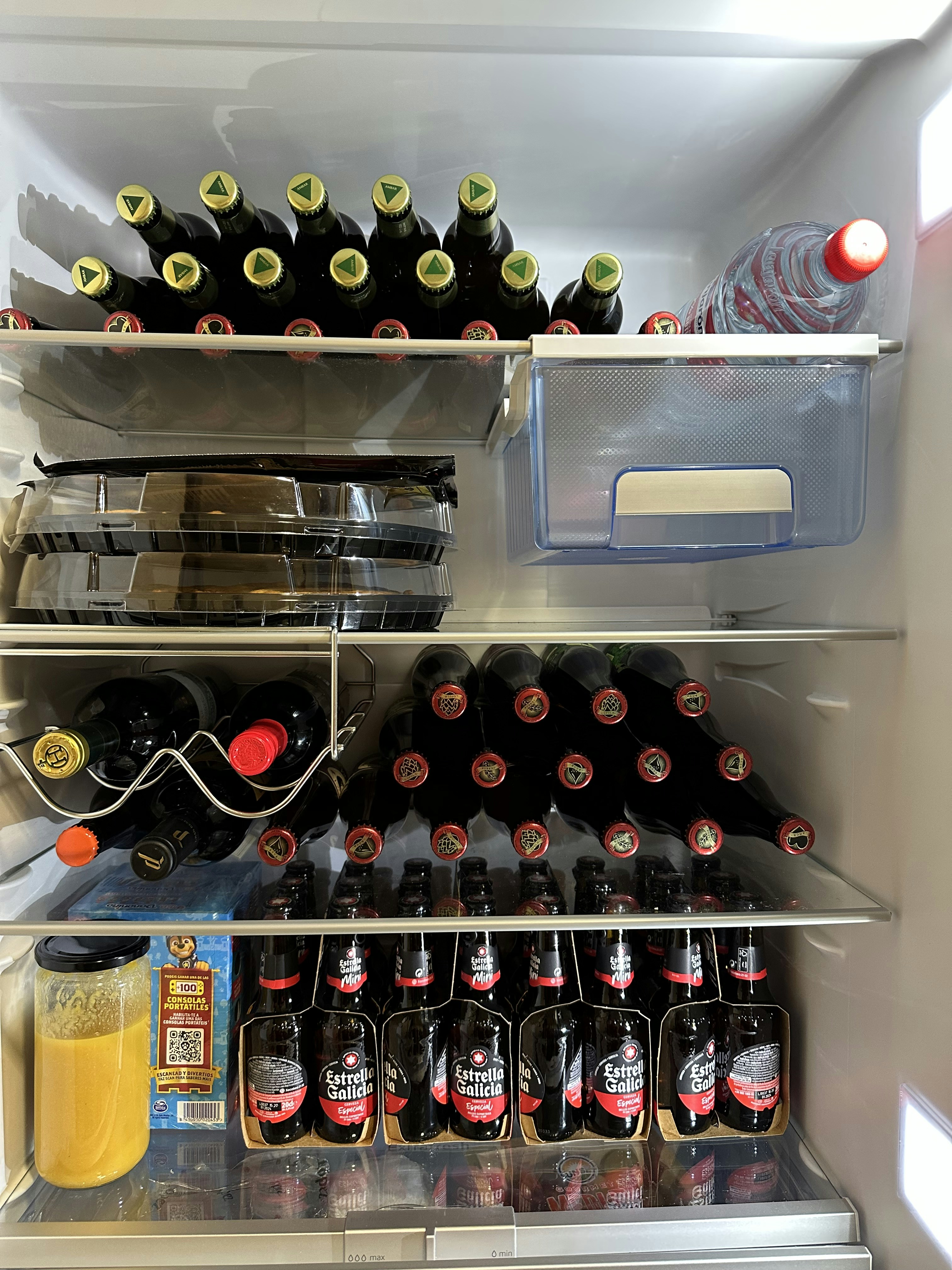 The Garage Refrigerator: A Timeline of Transformation from Grocery Overflow to Beverage Base