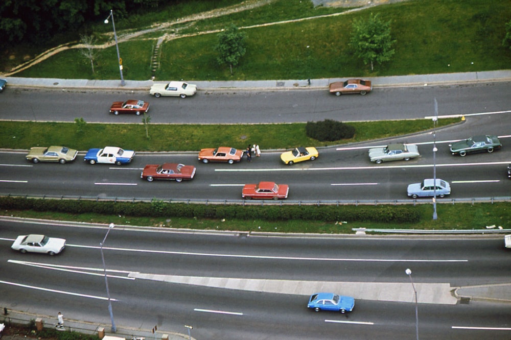 a bunch of cars that are sitting in the street