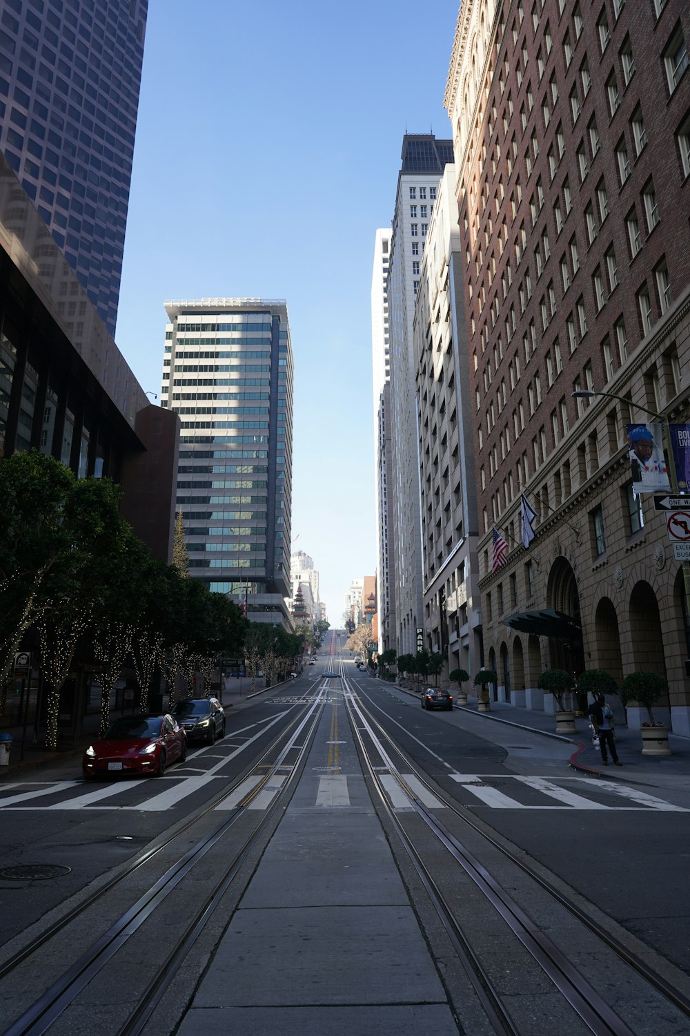 a view of a city street with buildings on both sides