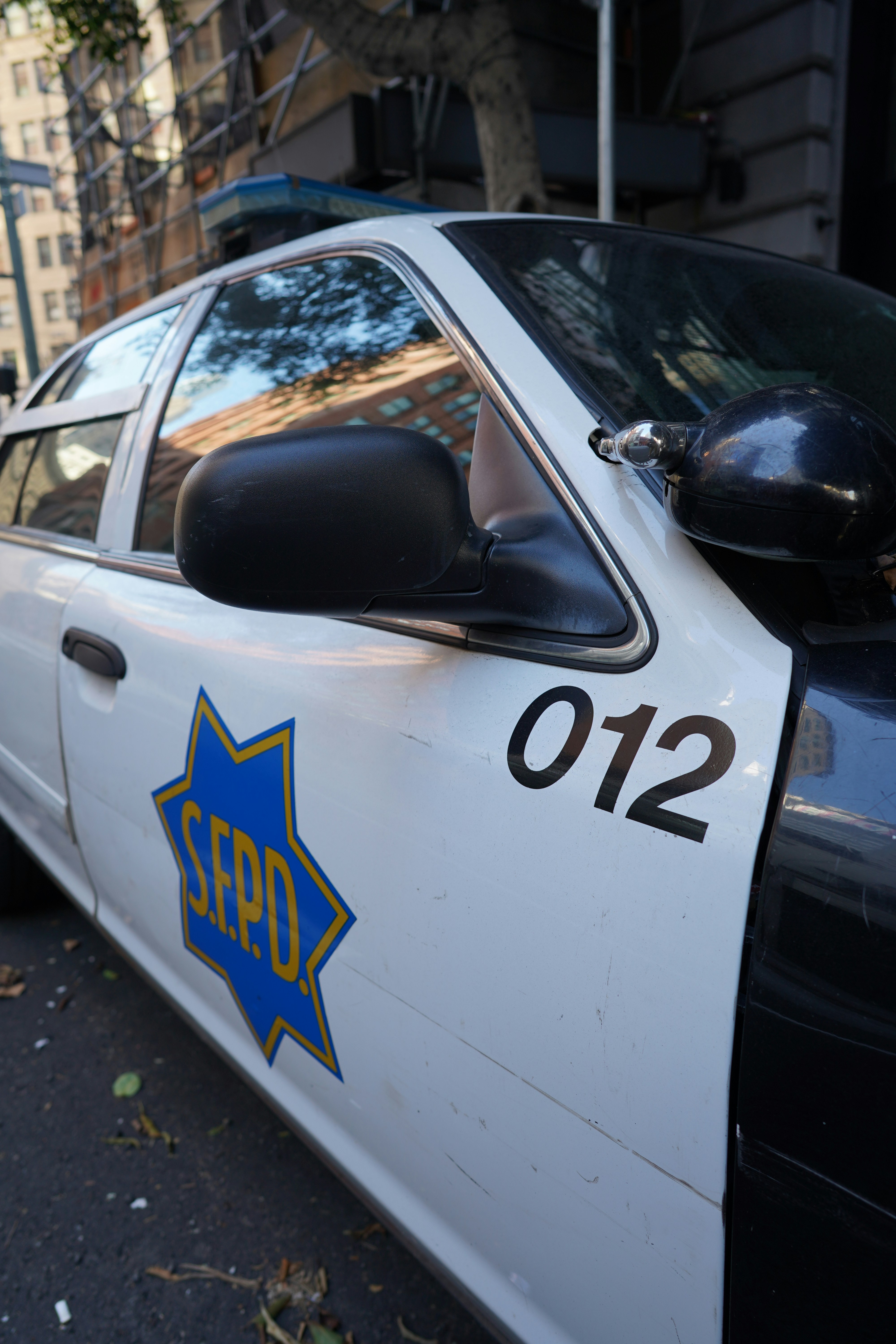 a police car parked on the side of the road