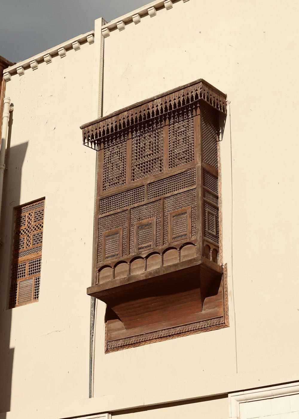 a building with a window and a balcony