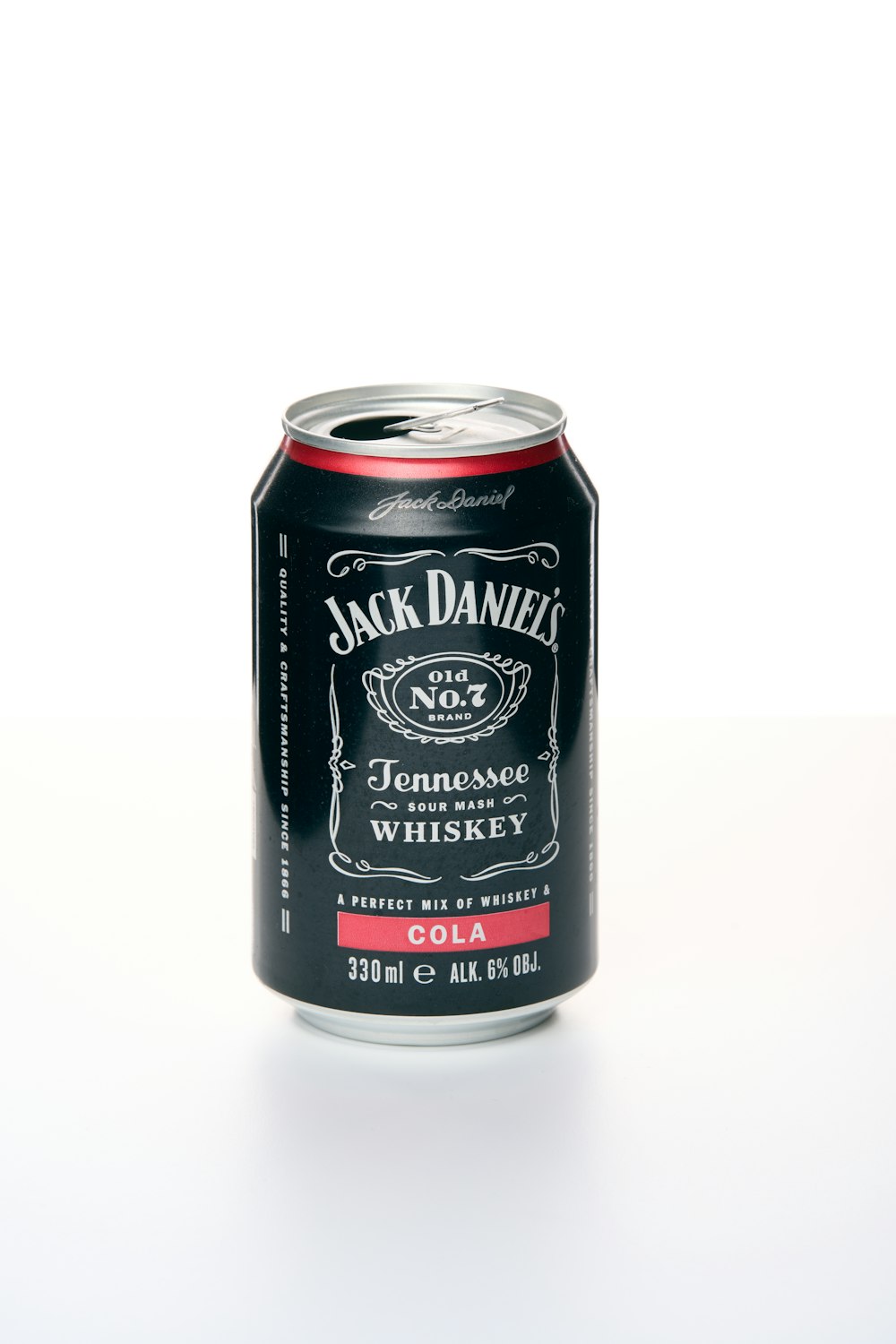 a can of jack daniels on a white surface