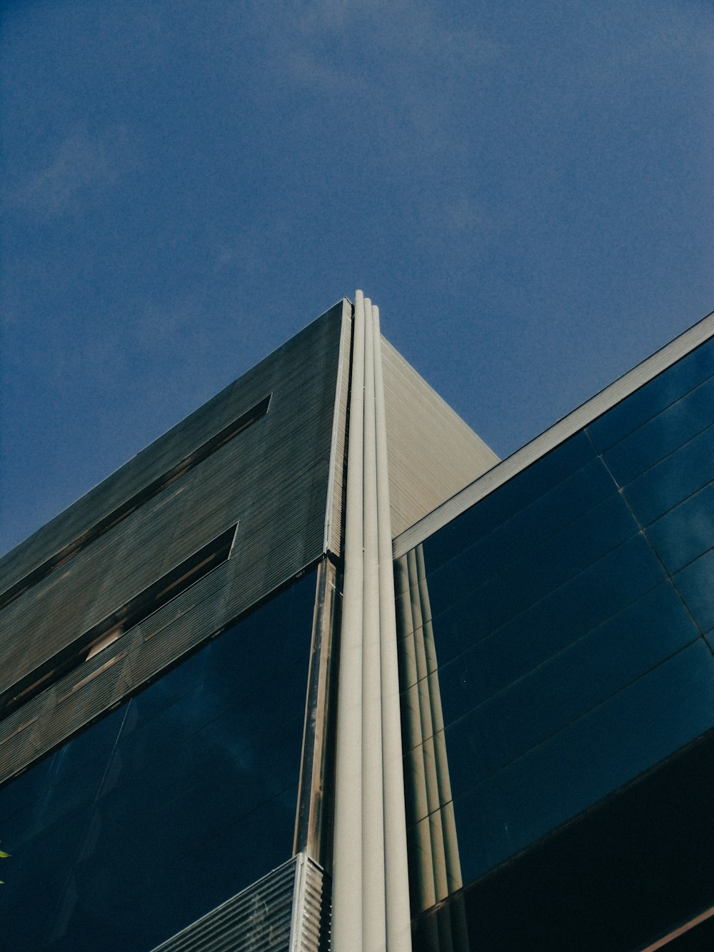 a tall building with a clock on the side of it