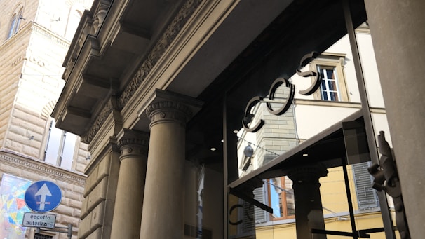 Photo of a modern identification sign installed at a building entrance.