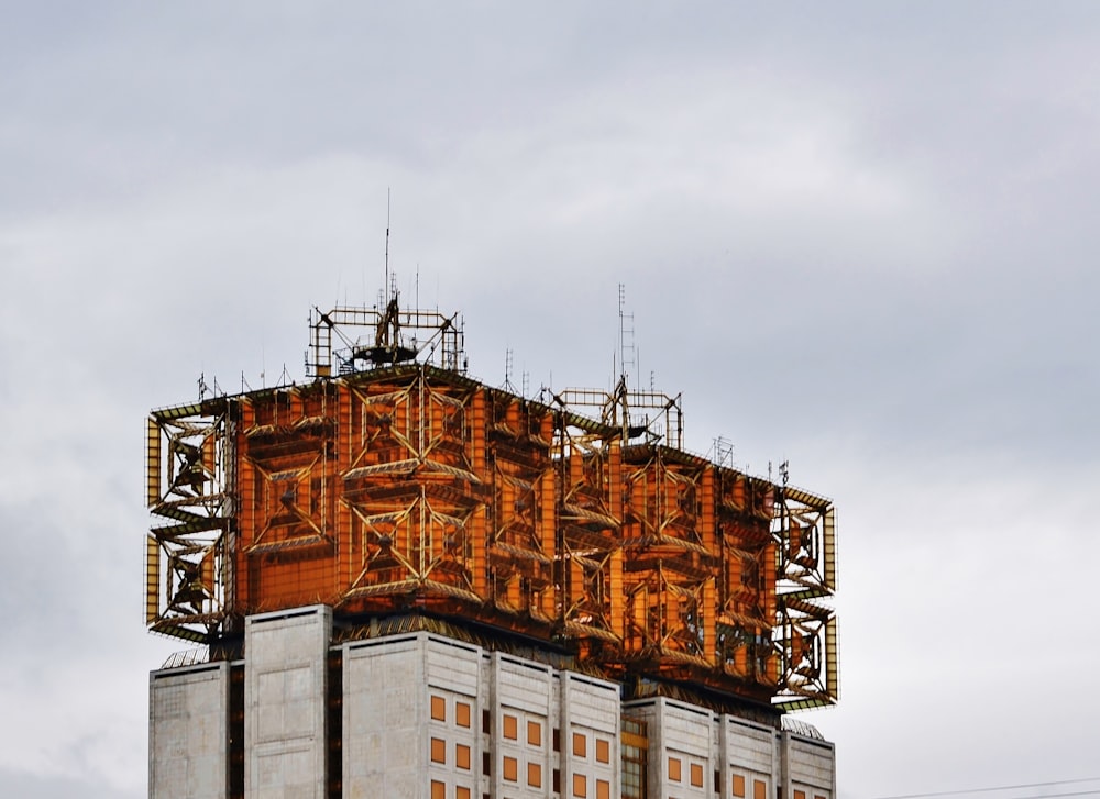 a tall building with scaffolding on top of it