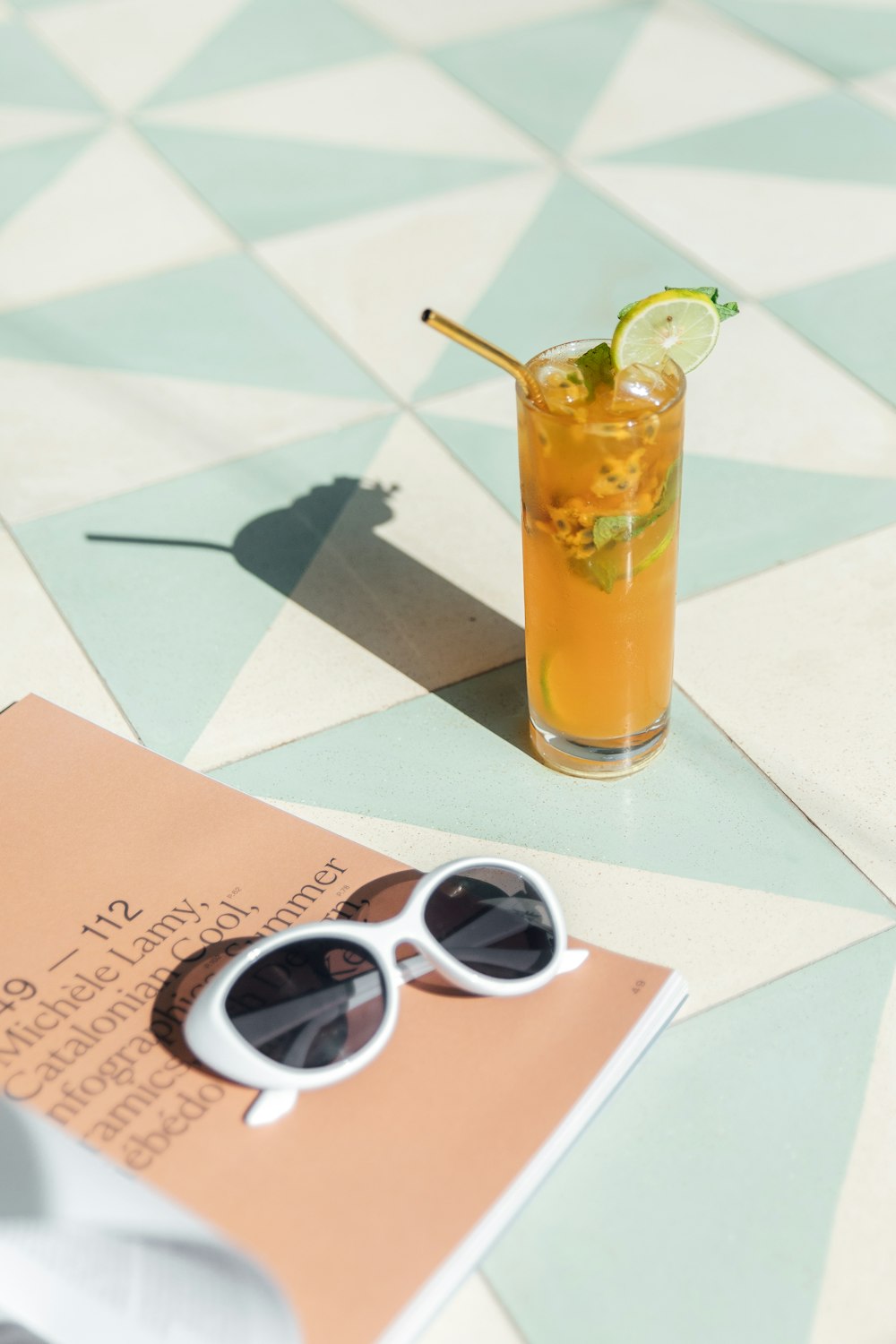 a book and a drink on a table