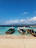 a couple of boats that are sitting in the water