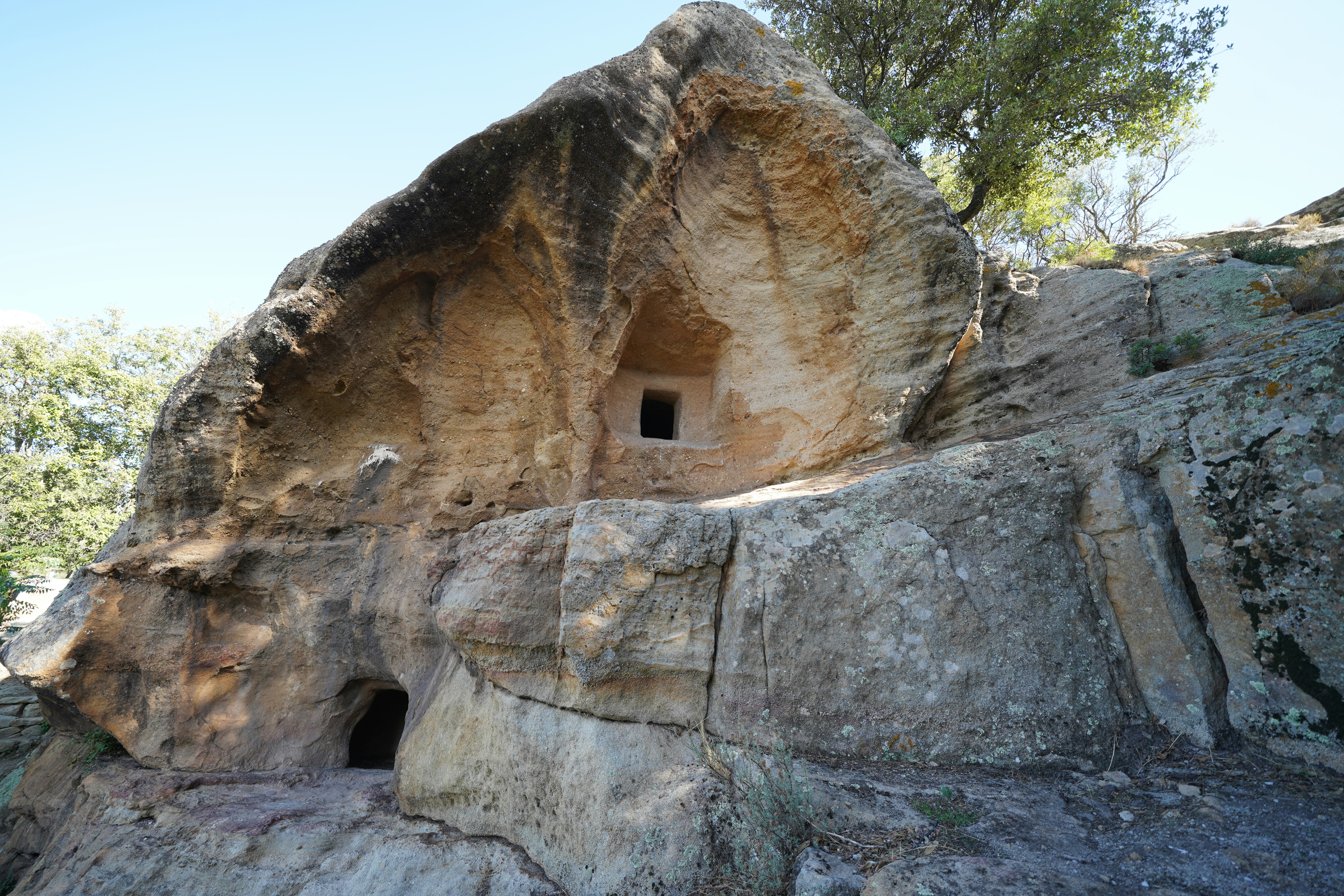 a cave built into the side of a mountain