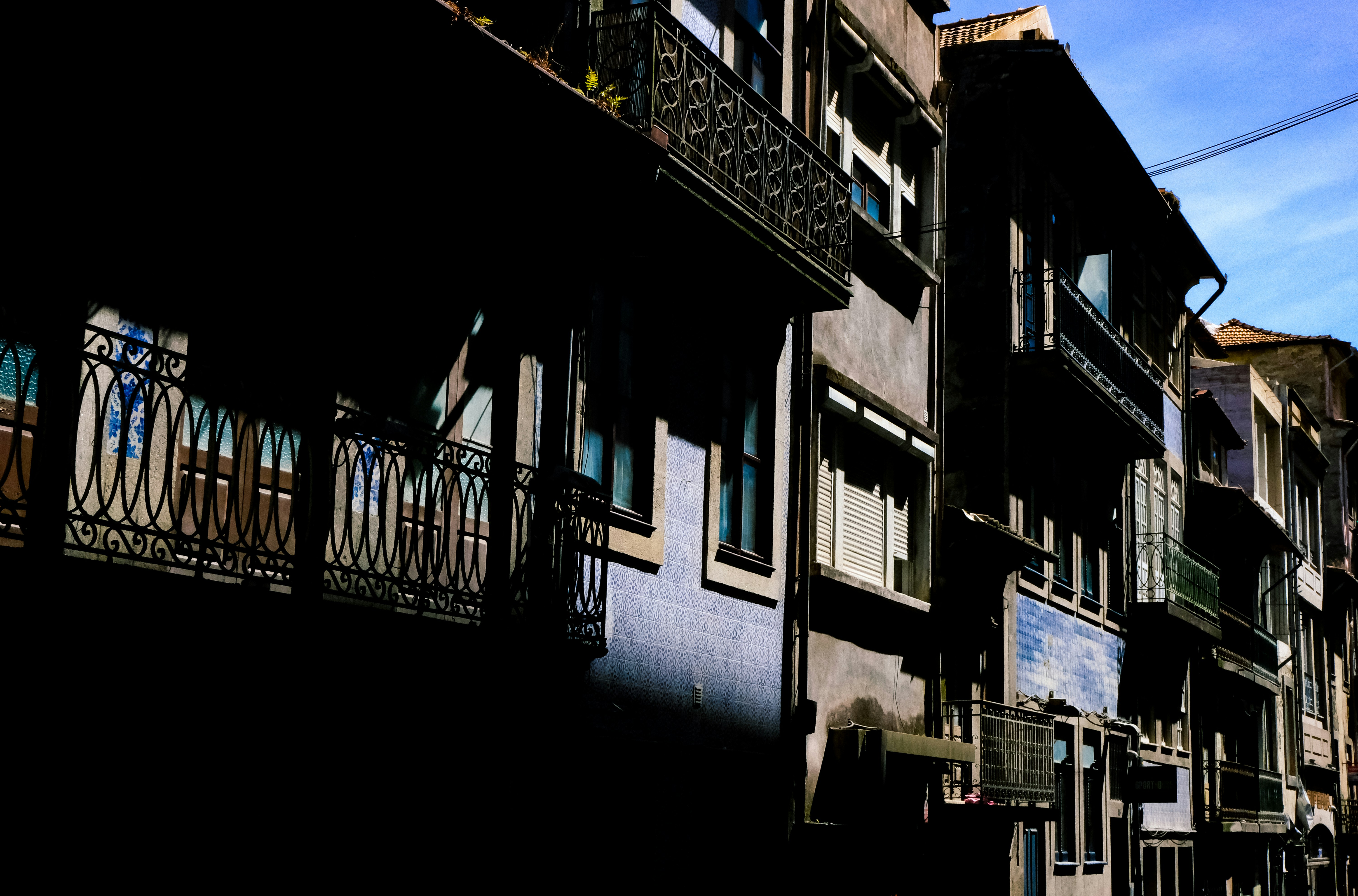a row of buildings with balconies and balconies on the balcon