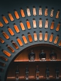 A vibrant display of international spirits arranged in a modern warehouse.