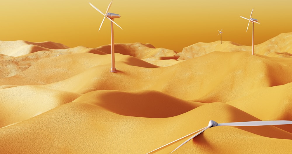 a group of wind mills in the desert