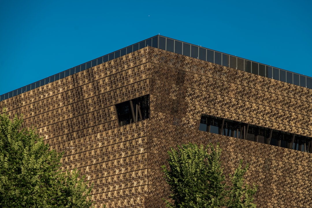 a building with a clock on the side of it,