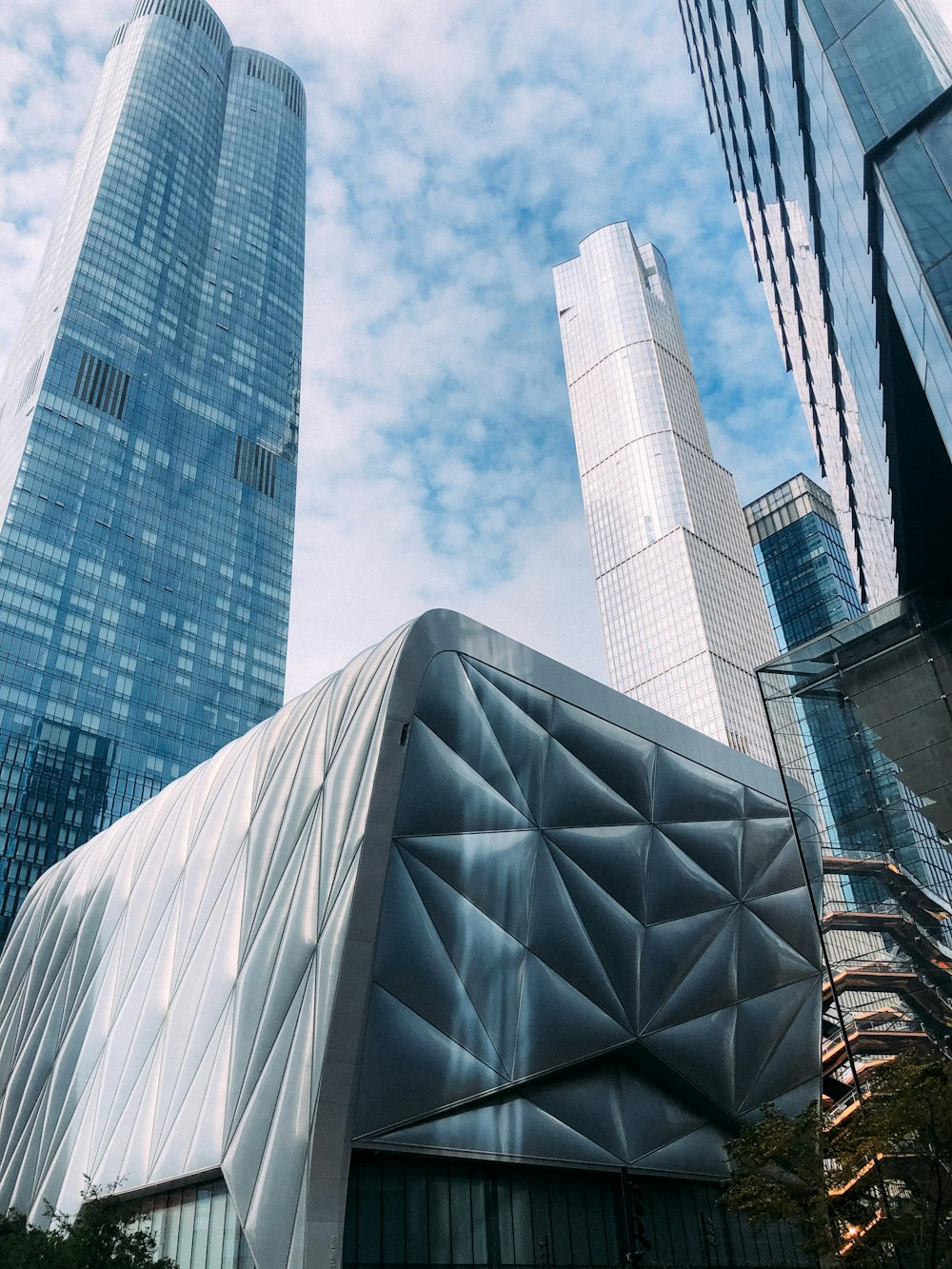 a group of tall buildings next to each other