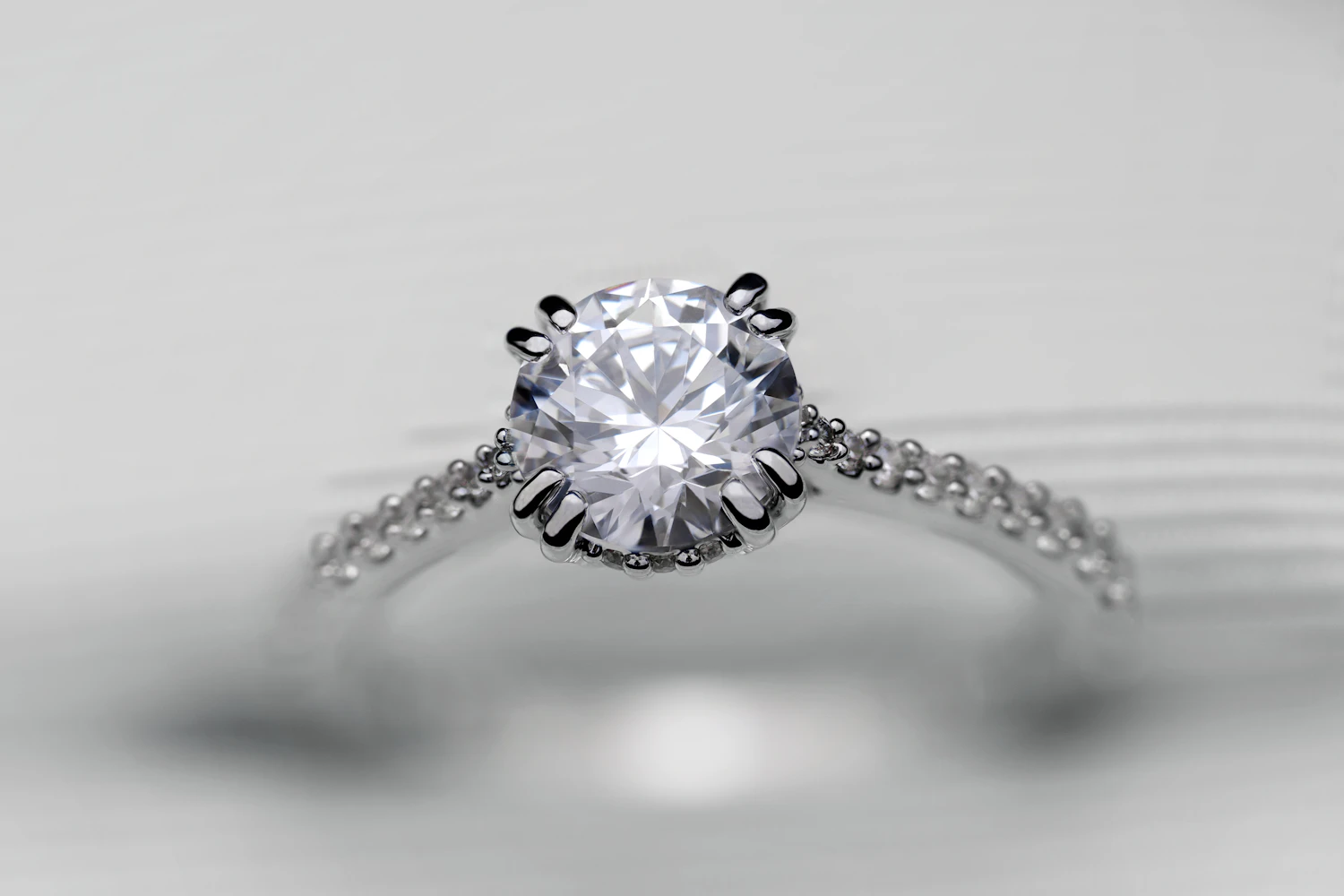 Diamond anniversary ring photographed on a clean white surface