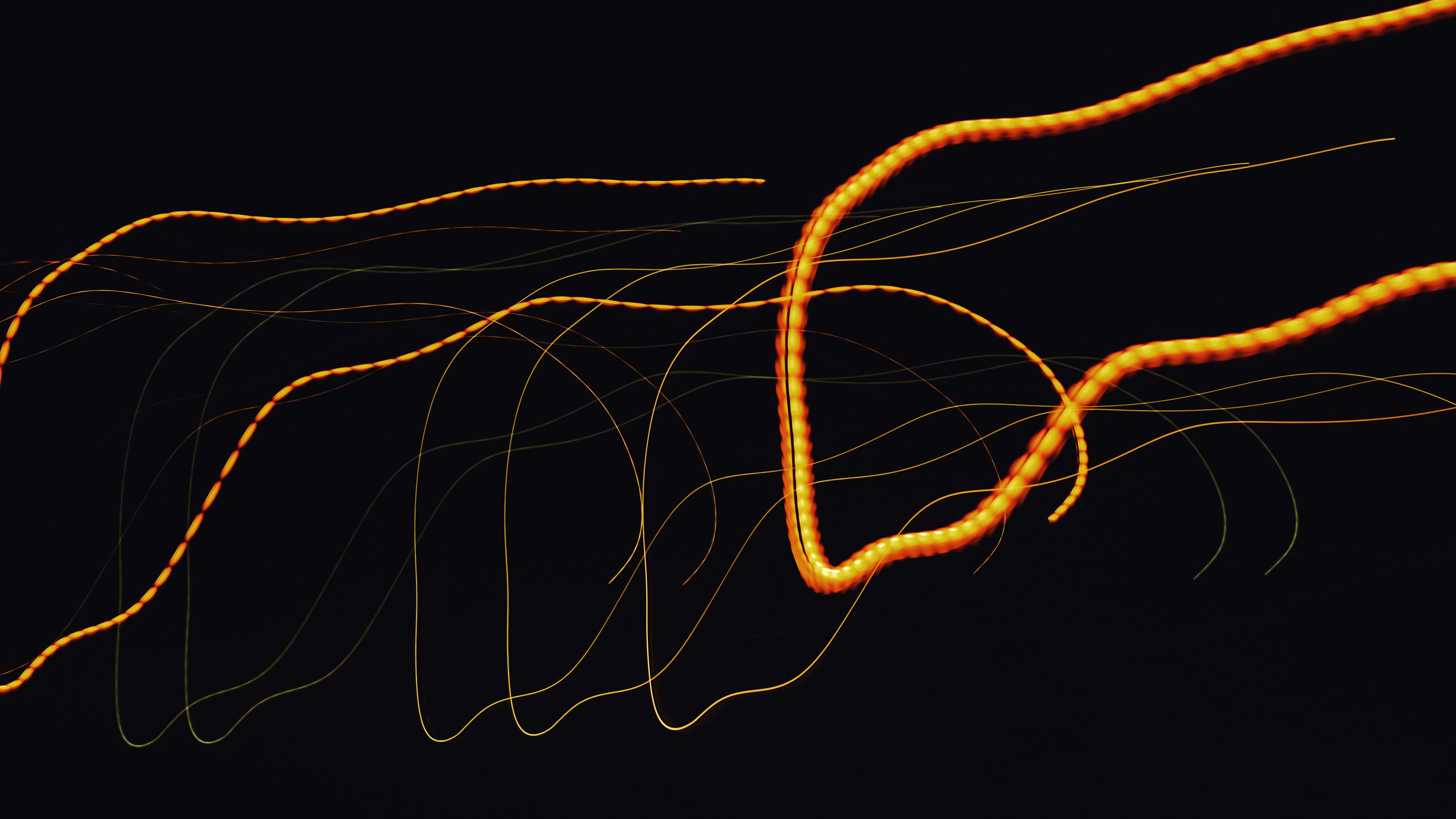 A messy doodle of yellow orange light streaks.