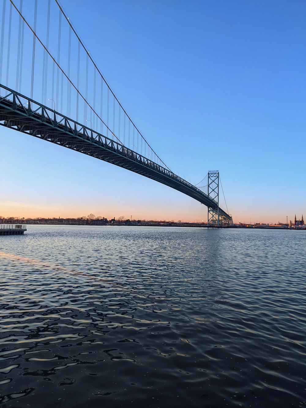 a large bridge spanning over a large body of water