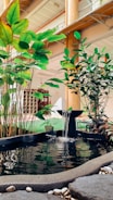 Elegant indoor fountain with transparent water streams highlighting architectural features