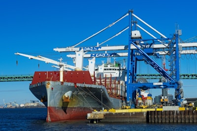 a large cargo ship docked at a dock