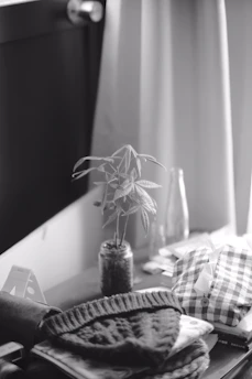 A cozy home setting with essential household items arranged invitingly on a table.