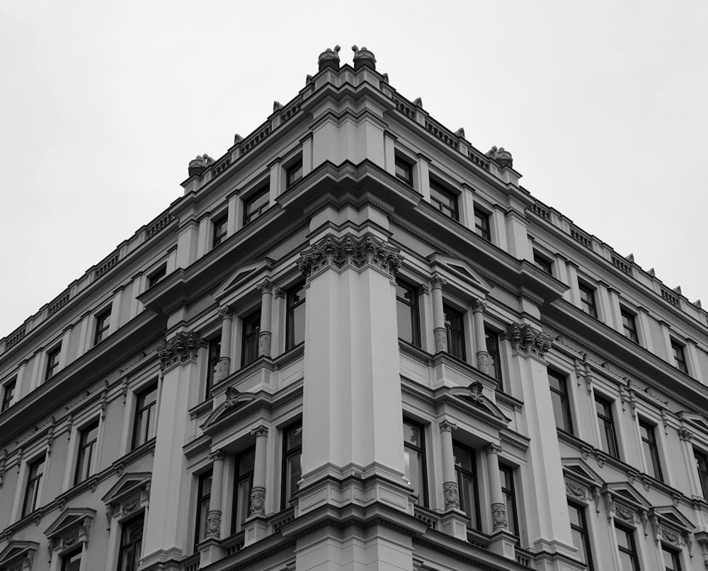 a black and white photo of a tall building