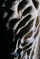 High-definition texture study highlighting the subtle shimmer and texture variations of natural stone.