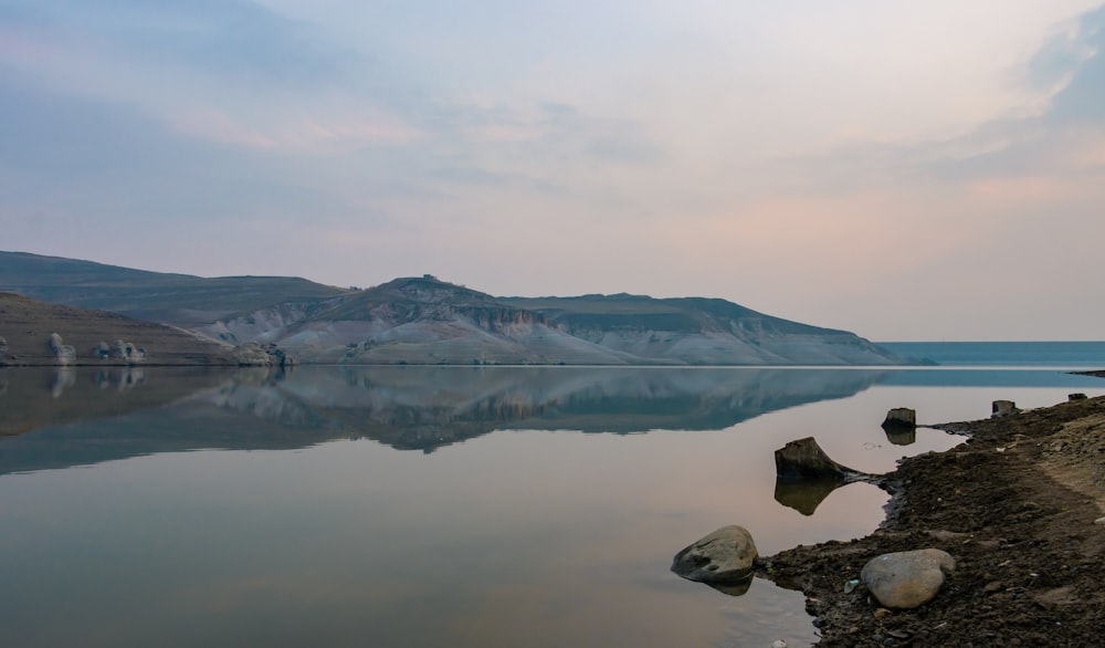 a large body of water surrounded by mountains