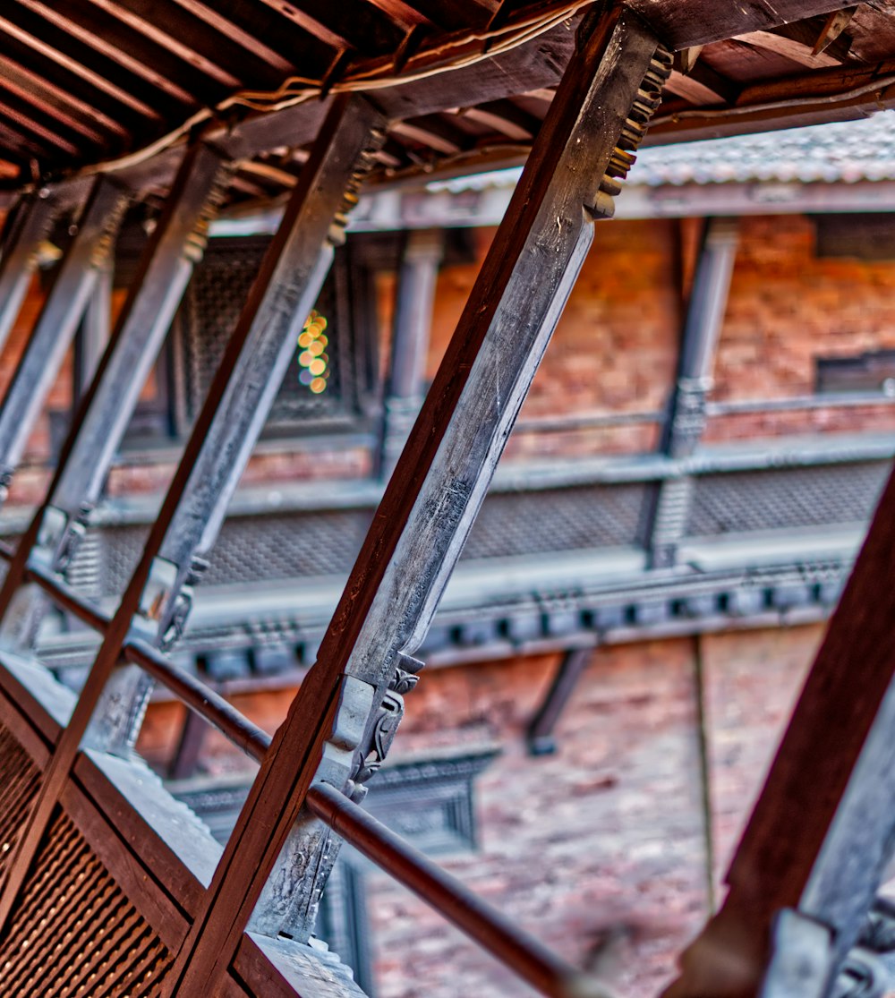 a building with a bunch of metal bars hanging from it's sides