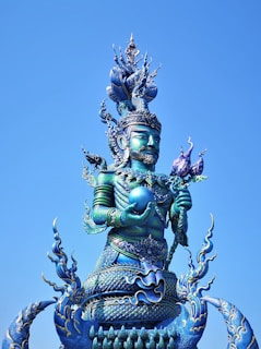 A vibrant statue with a fantasy theme.