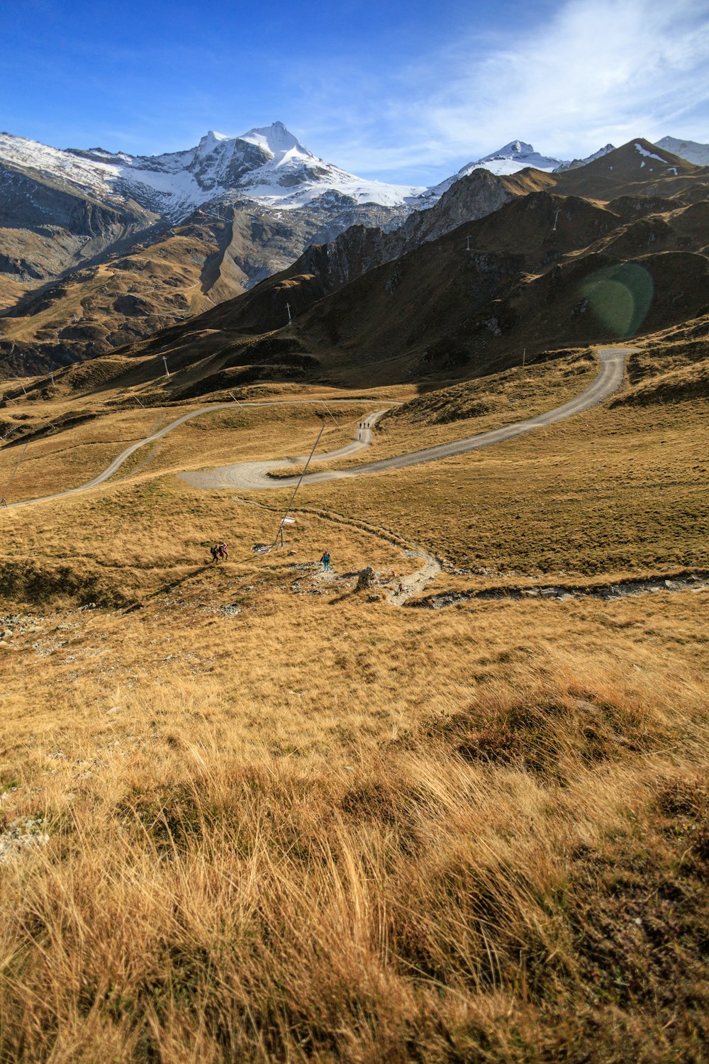 a view of a winding road in the mountains