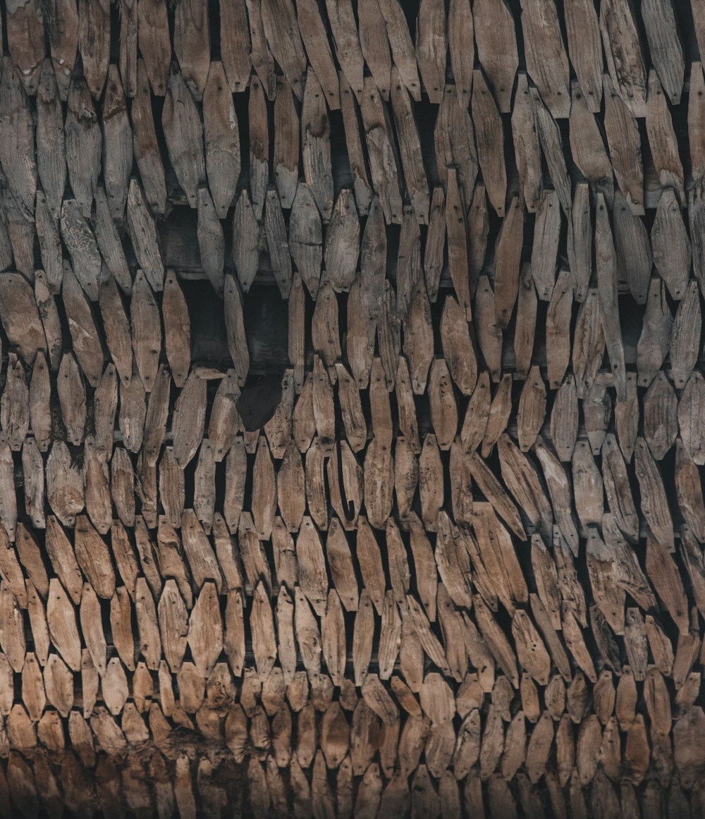 a large pile of logs stacked on top of each other