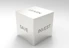 A three-dimensional cube with words on its visible sides, featuring 'LEARN' on the top, 'SAVE' on the left face, and 'INVEST' on the right face. The cube is rendered in a minimalist white and gray color palette, creating a clean and professional look.