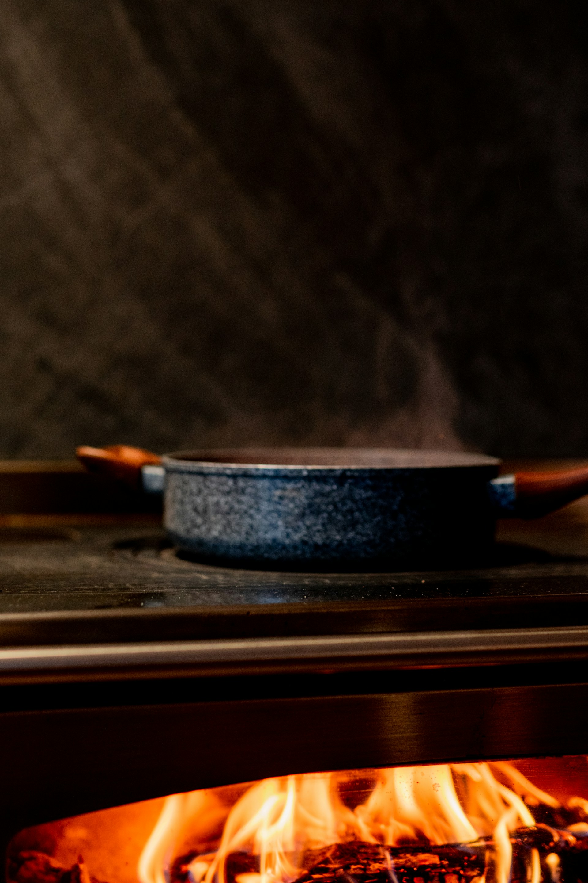 a close up of a fire burning in a stove