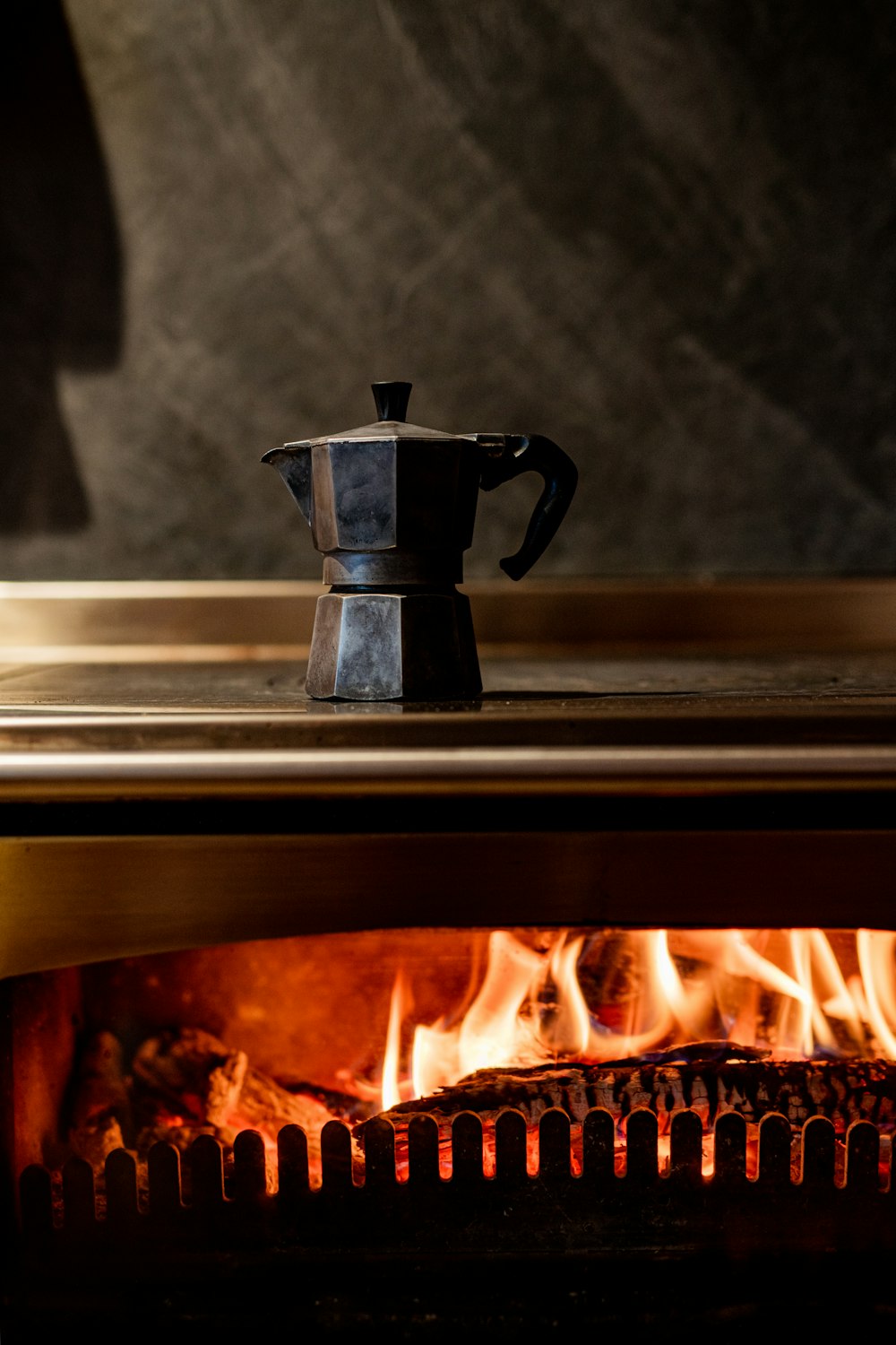 a stove with a pot on top of it