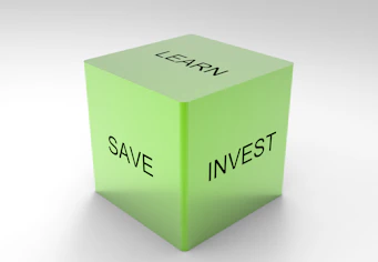 A green 3D cube with the words 'LEARN', 'SAVE', and 'INVEST' on its visible sides, set against a plain white background.