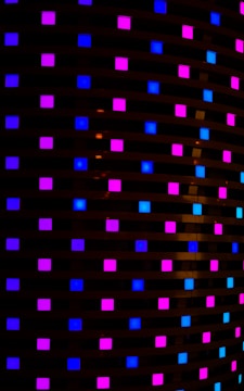 Puzzle game interface with glowing neon blocks and smooth animations.