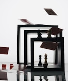 a picture frame with chess pieces in it