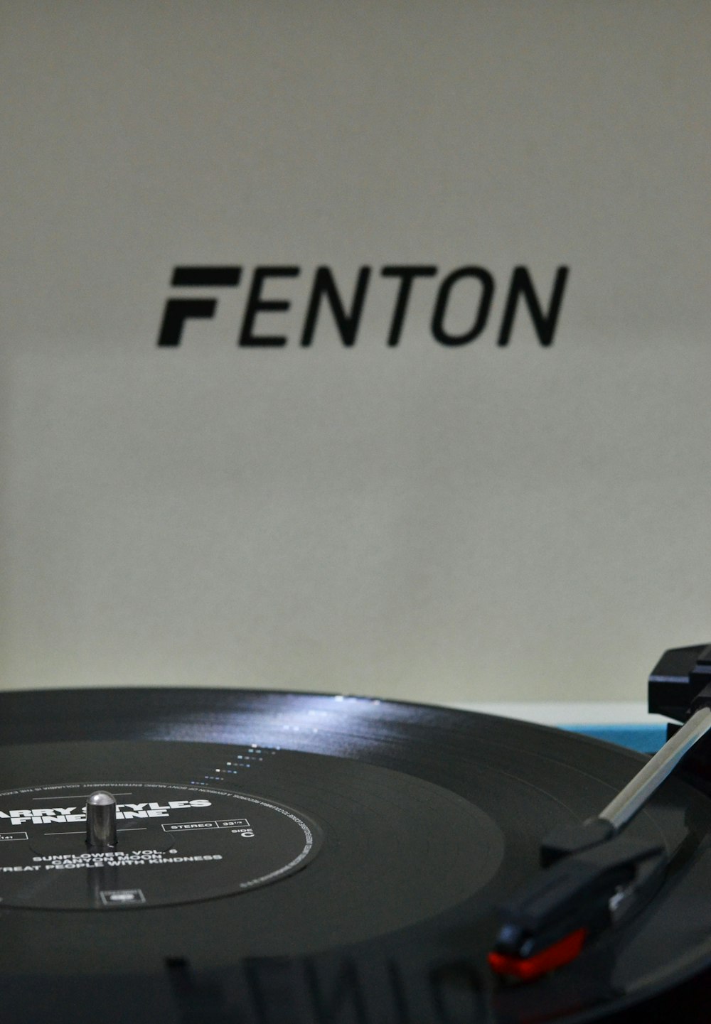 a close up of a record player on a table