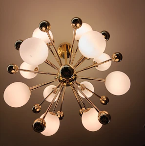 Elegant warm white LED chandelier illuminating a modern dining room