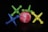 A collection of colorful plastic jacks and a marble-like ball spread out on a dark surface. The jacks come in various colors including green, blue, and yellow, while the ball has a pink and white marbled pattern.